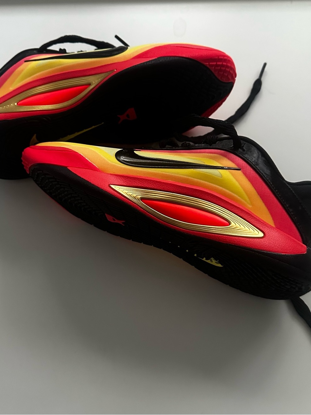 Nike Black Sneakers with Red, Orange, Yellow Gradient and Gold Accents